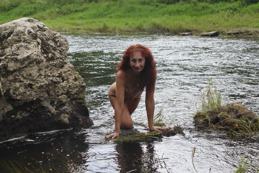 Near a boulder in the river
