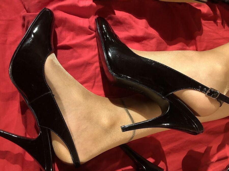 High Heels and Nylons on Bed