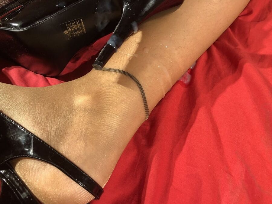 High Heels and Nylons on Bed