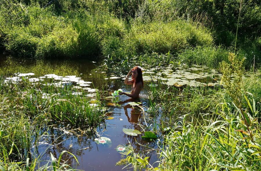 In a weedy pond