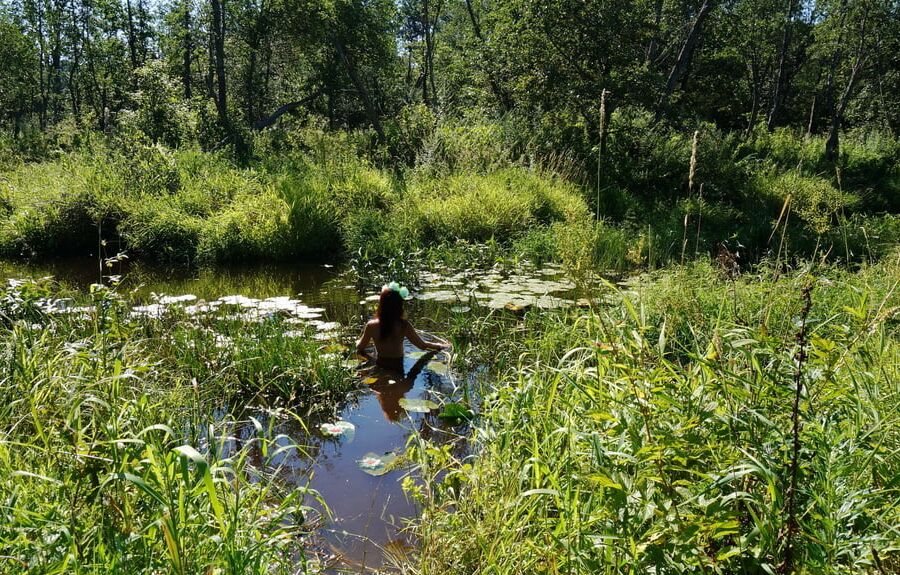 In a weedy pond