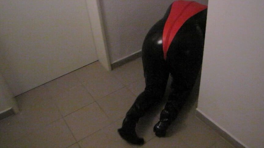 Petplay in latex suit ...