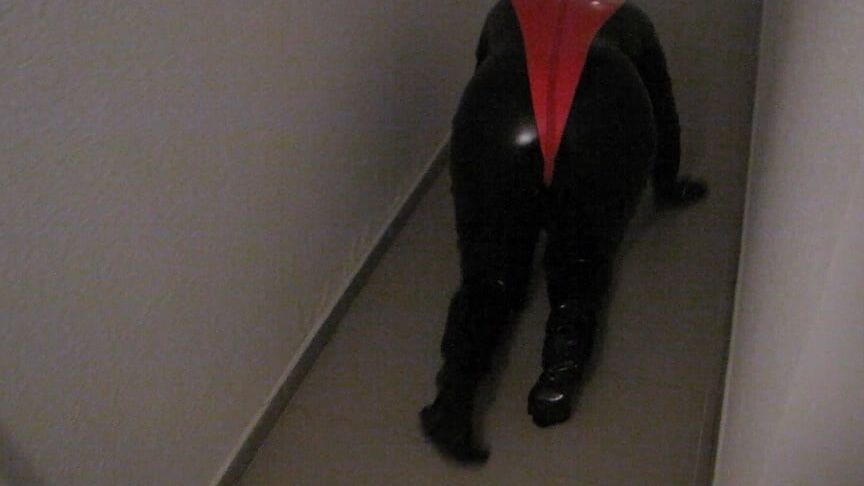 Petplay in latex suit ...