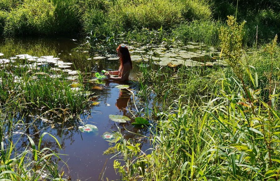 In a weedy pond