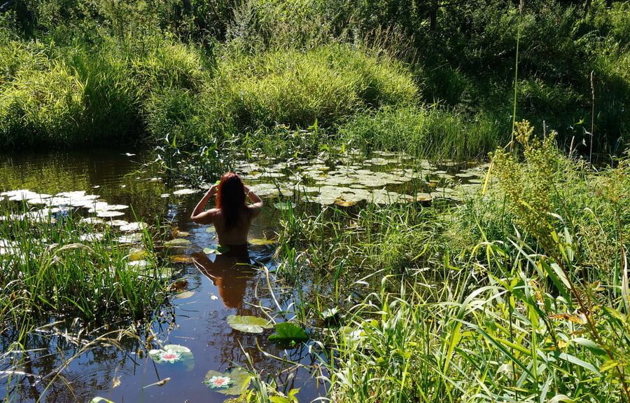 In a weedy pond