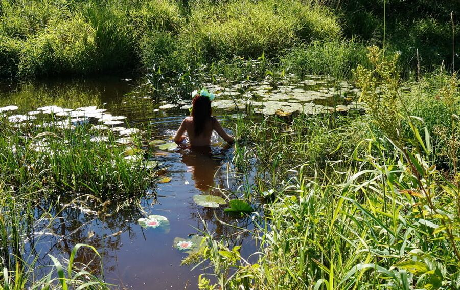 In a weedy pond