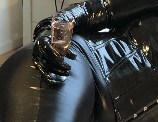 Black Catsuit, Boots, Corset and Vibrator