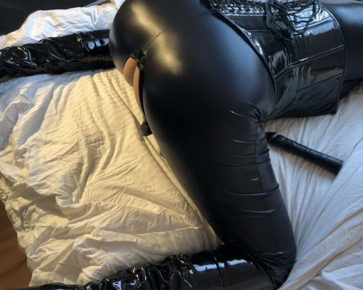 Black Catsuit, Boots, Corset and Vibrator