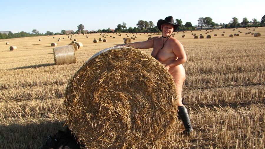 Completely naked in a corn field ...