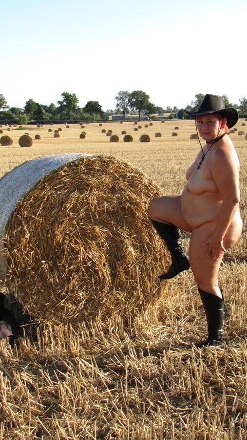 Completely naked in a corn field ...