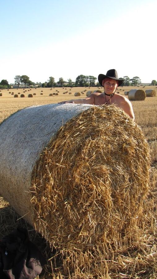 Completely naked in a corn field ...