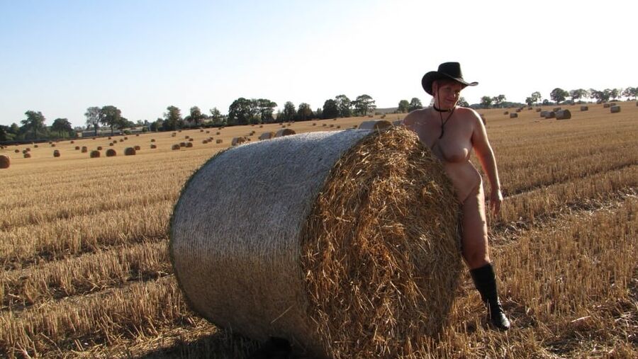 Completely naked in a corn field ...