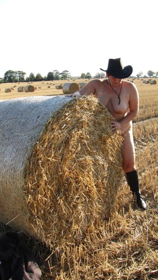 Completely naked in a corn field ...