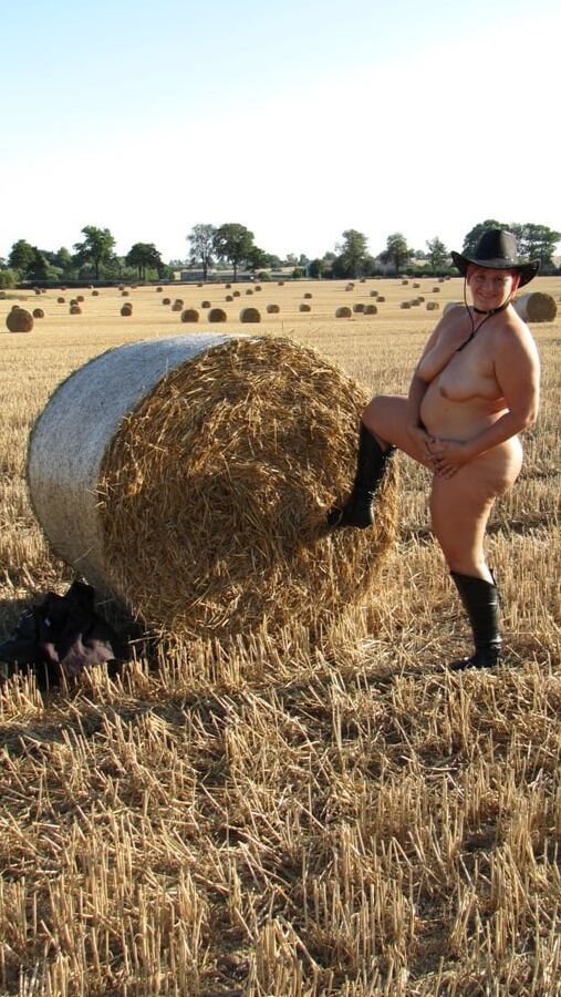 Completely naked in a corn field ...