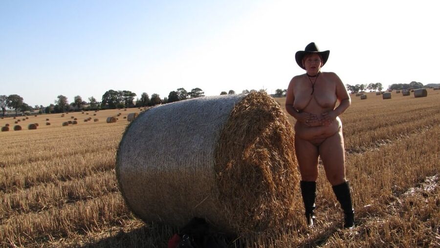 Completely naked in a corn field ...