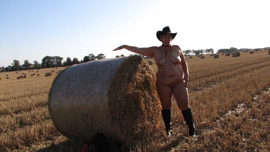 Completely naked in a corn field ...