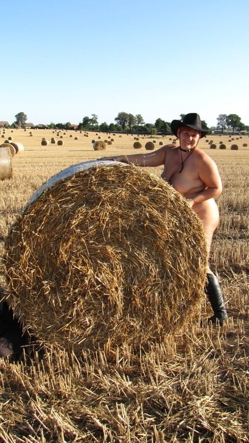 Completely naked in a corn field ...