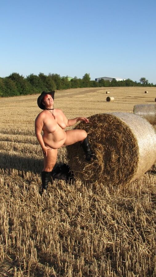 Completely naked in a corn field ...