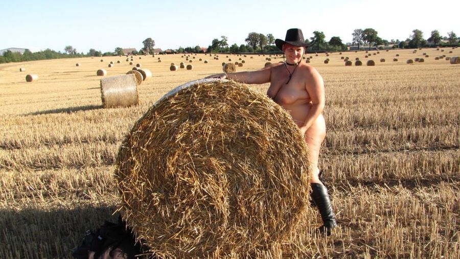 Completely naked in a corn field ...