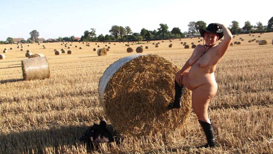 Completely naked in a corn field ...