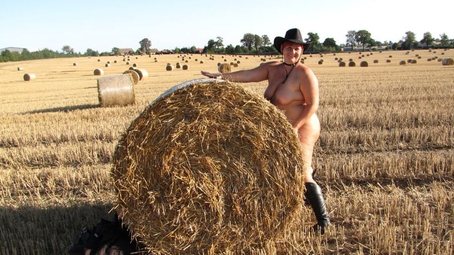 Completely naked in a corn field ...