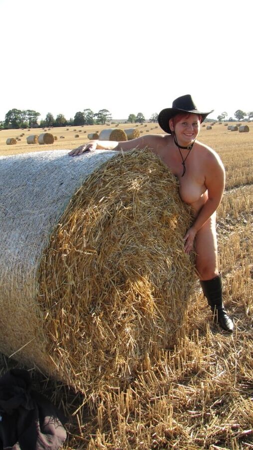 Completely naked in a corn field ...