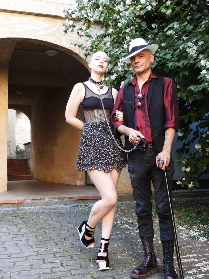 Bdsm couple walking in town