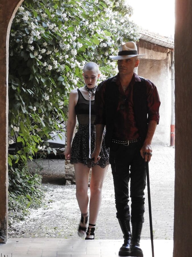 Bdsm couple walking in town