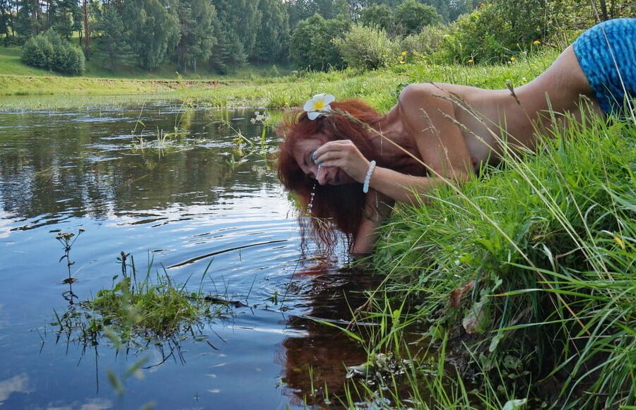 Mermaid plays with water