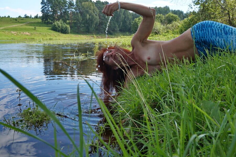Mermaid plays with water