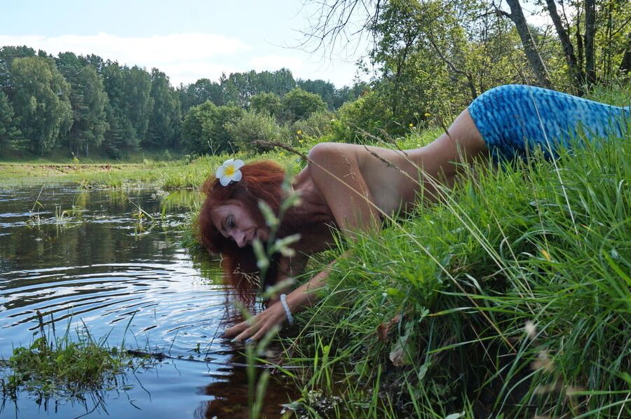 Mermaid plays with water