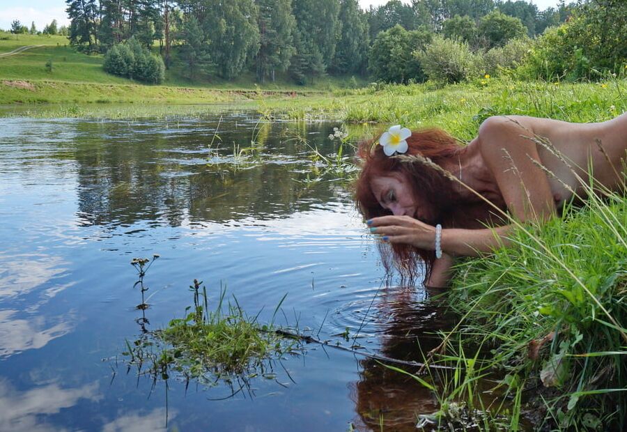 Mermaid plays with water