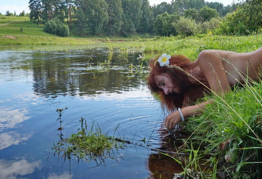 Mermaid plays with water
