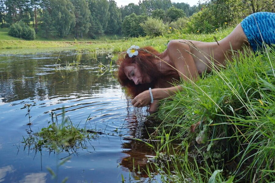 Mermaid plays with water