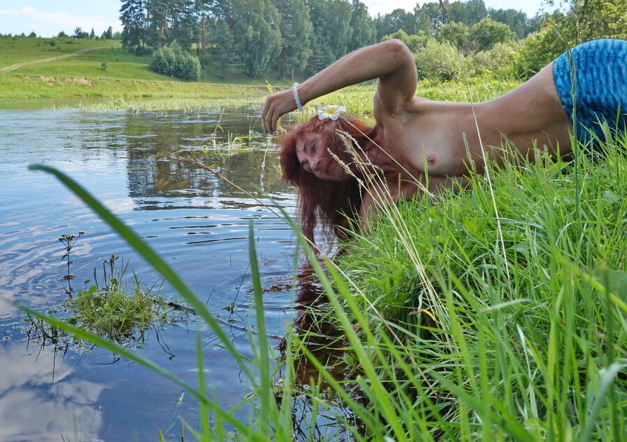 Mermaid plays with water