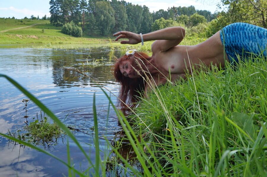 Mermaid plays with water