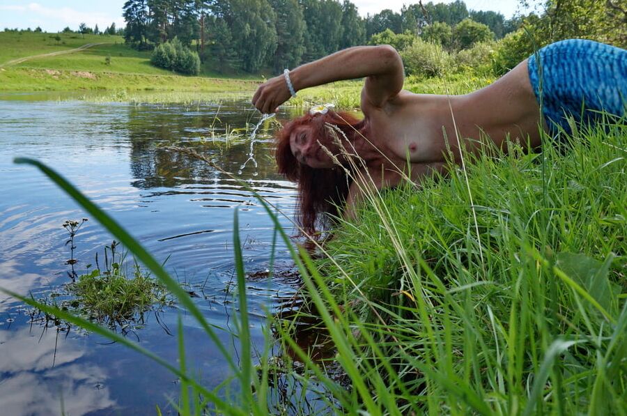 Mermaid plays with water