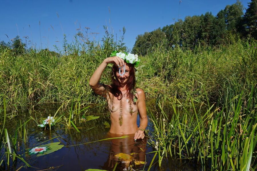 In pond with waterflowers