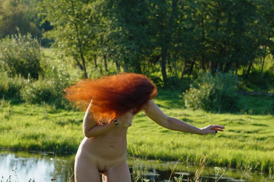 Flame Hair naked upon river