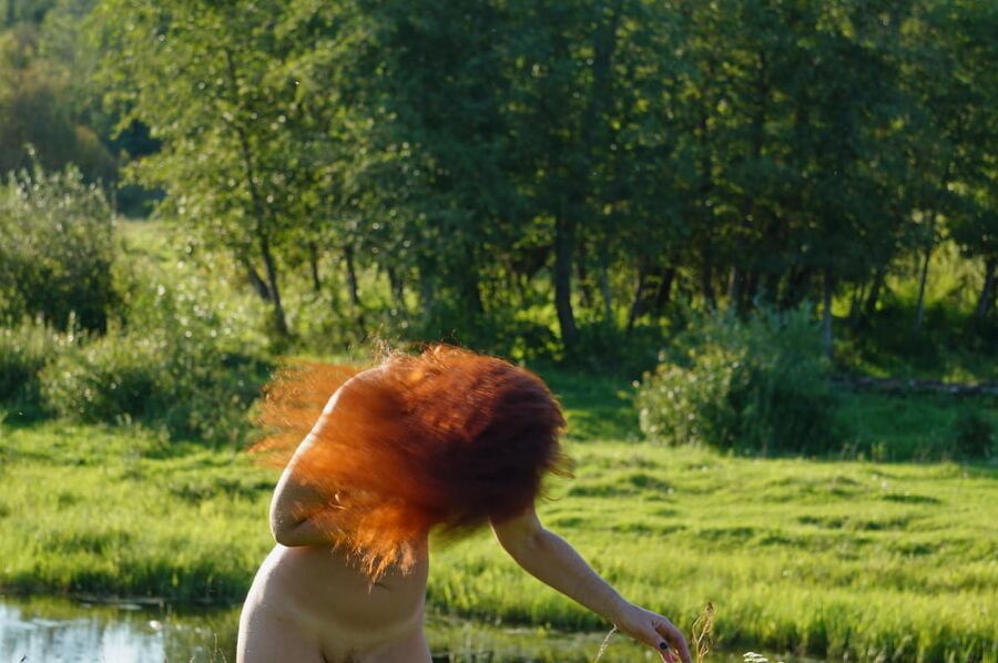 Flame Hair naked upon river