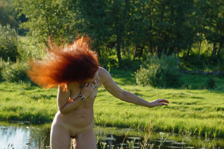 Flame Hair naked upon river