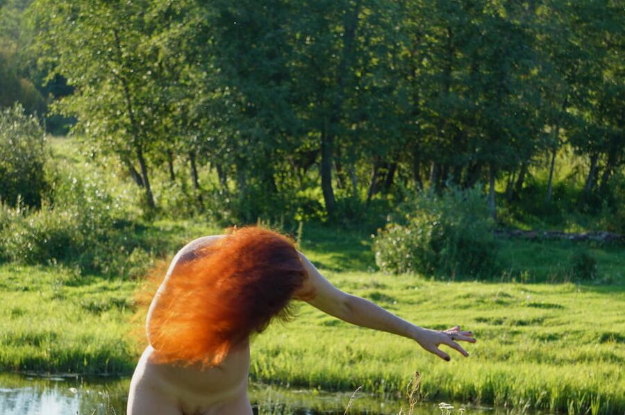 Flame Hair naked upon river
