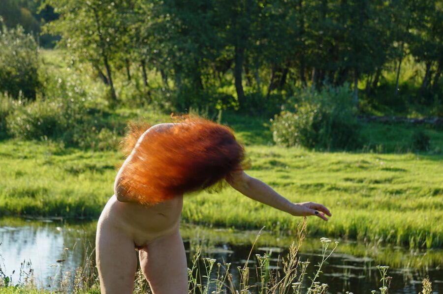Flame Hair naked upon river