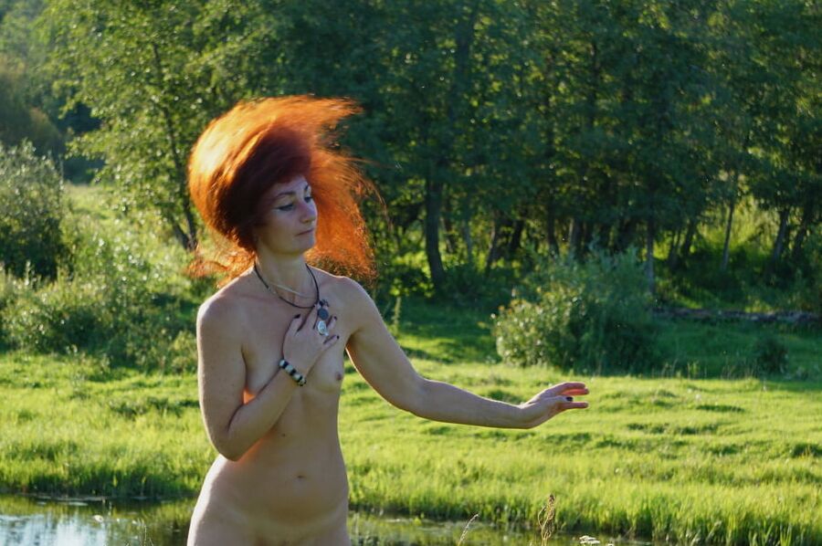 Flame Hair naked upon river