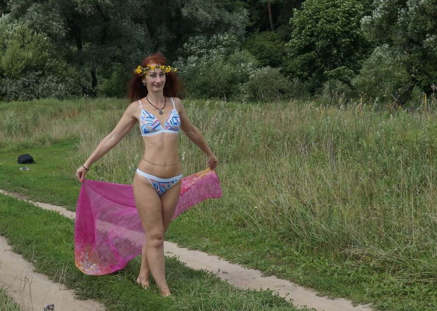 With a pink shawl