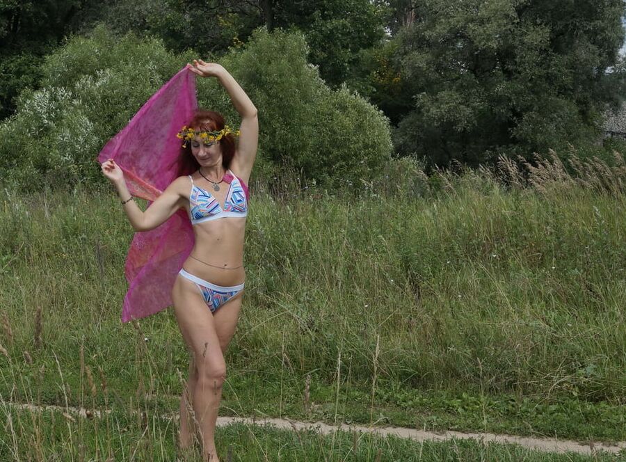 With a pink shawl