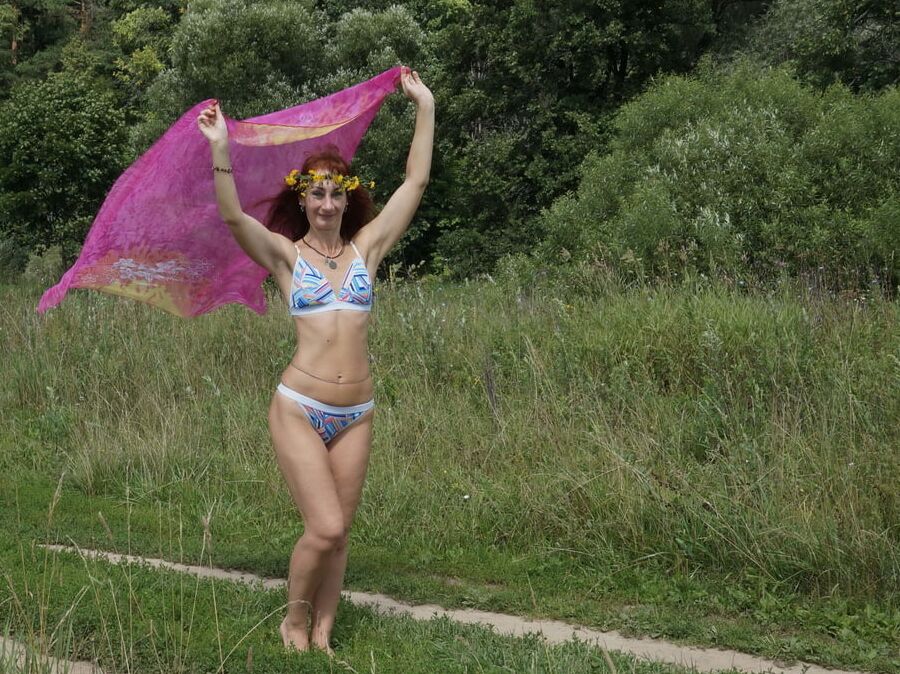 With a pink shawl