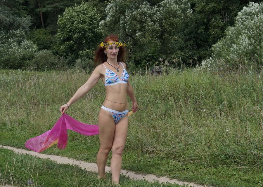 With a pink shawl