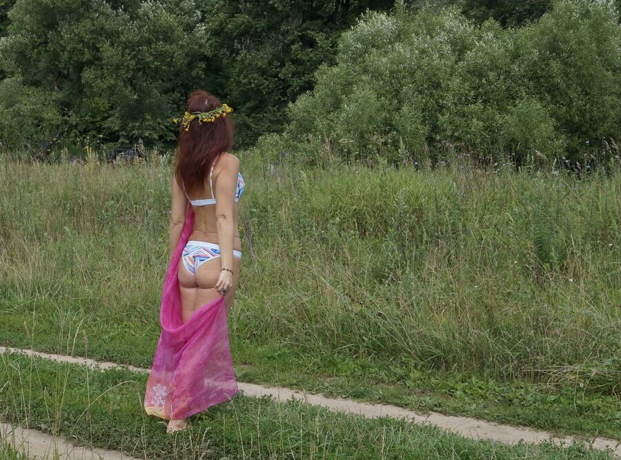With a pink shawl