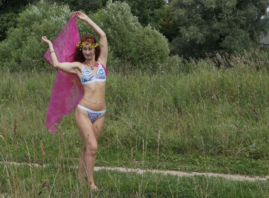 With a pink shawl